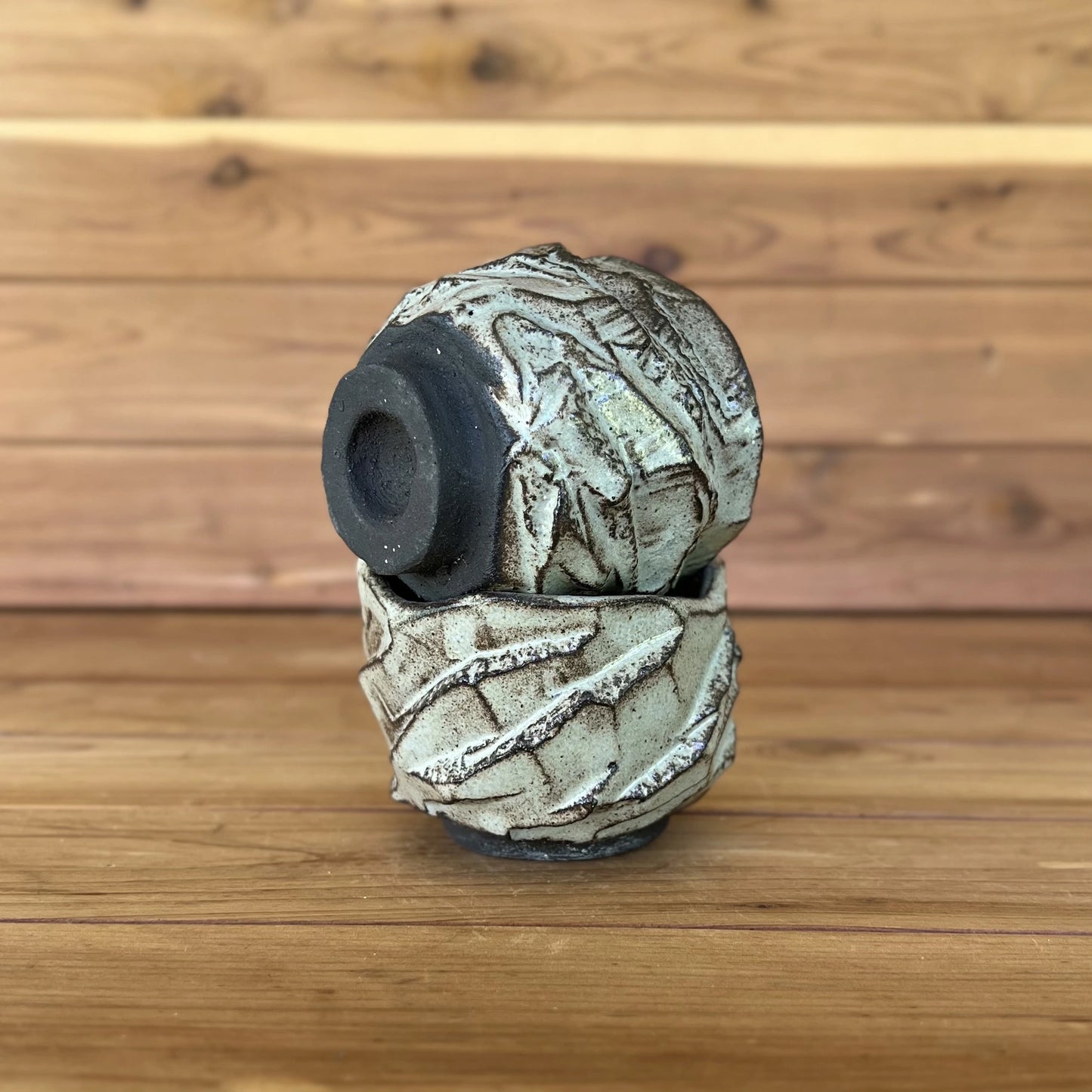 pair of black clay kurinuki pottery cups