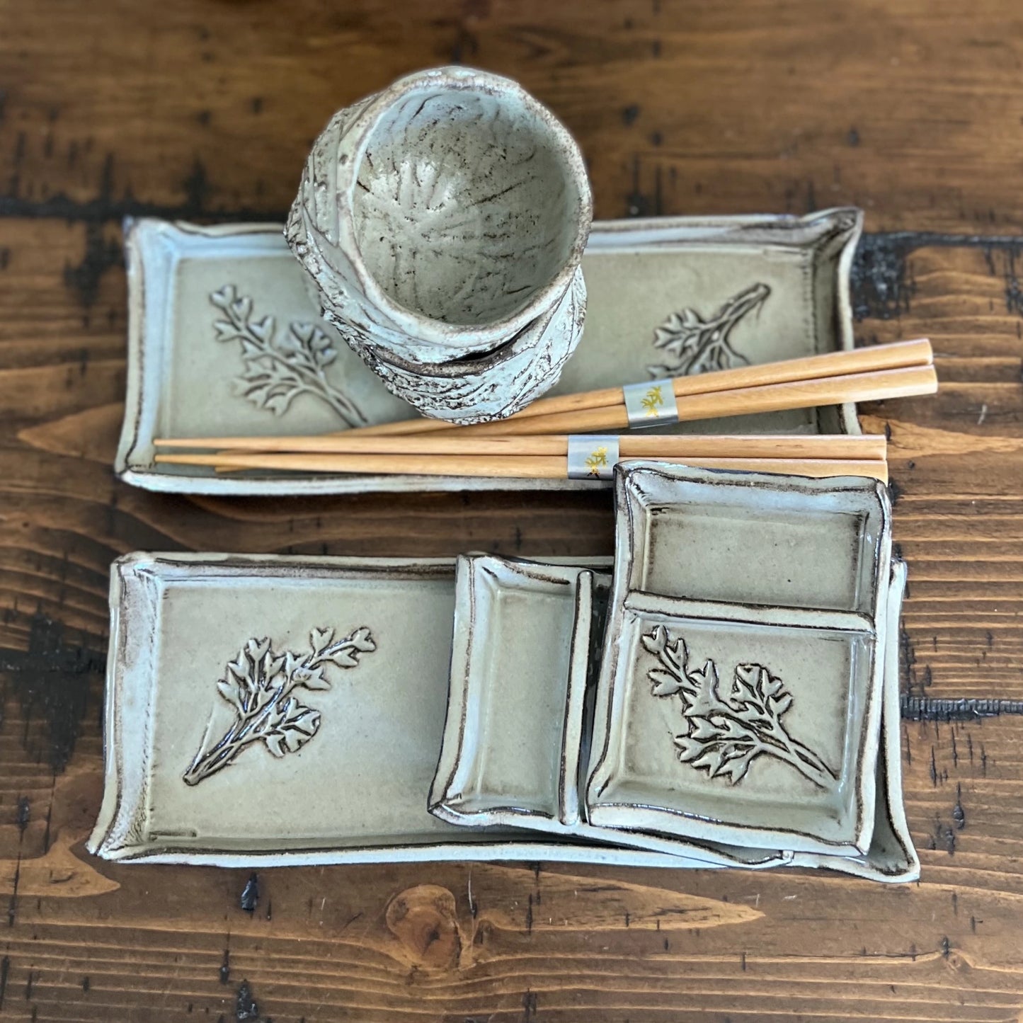 6 piece black ceramic sushi set with botanical stamp glazed in silver gray including kurinuki cup set and chopsticks 