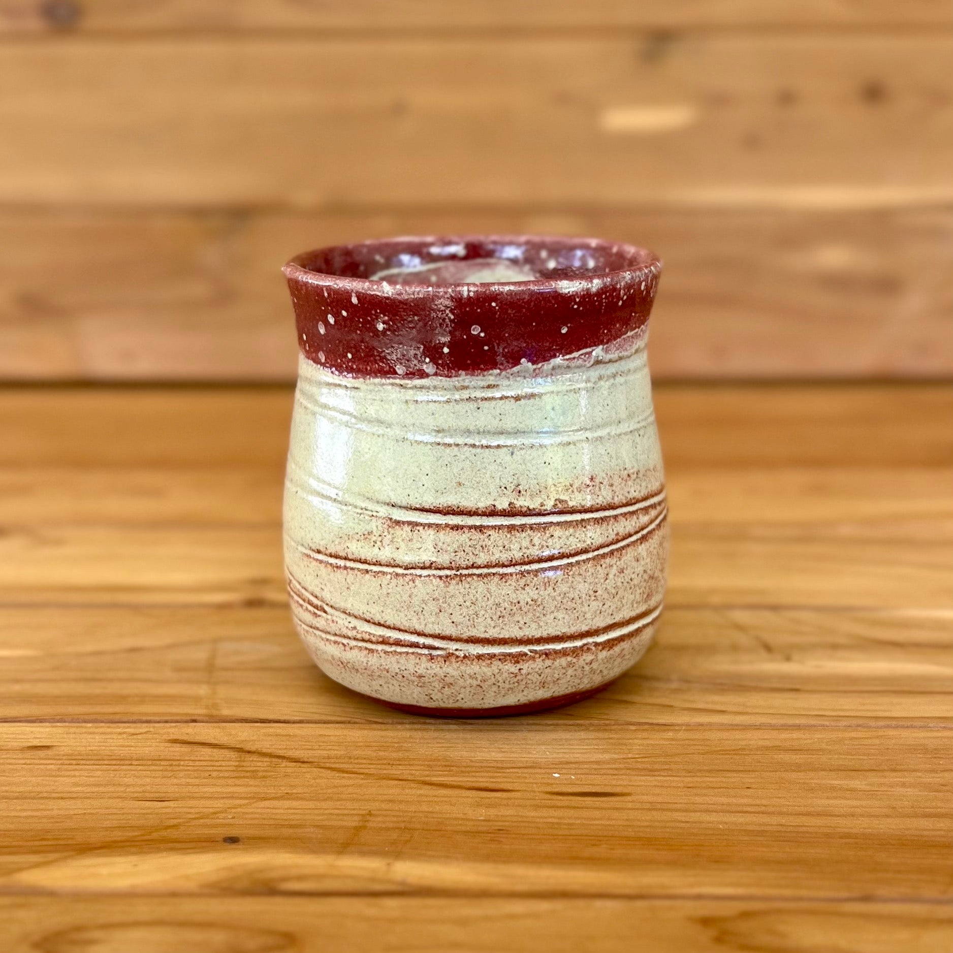 small stemless red clay ceramic wine tumbler