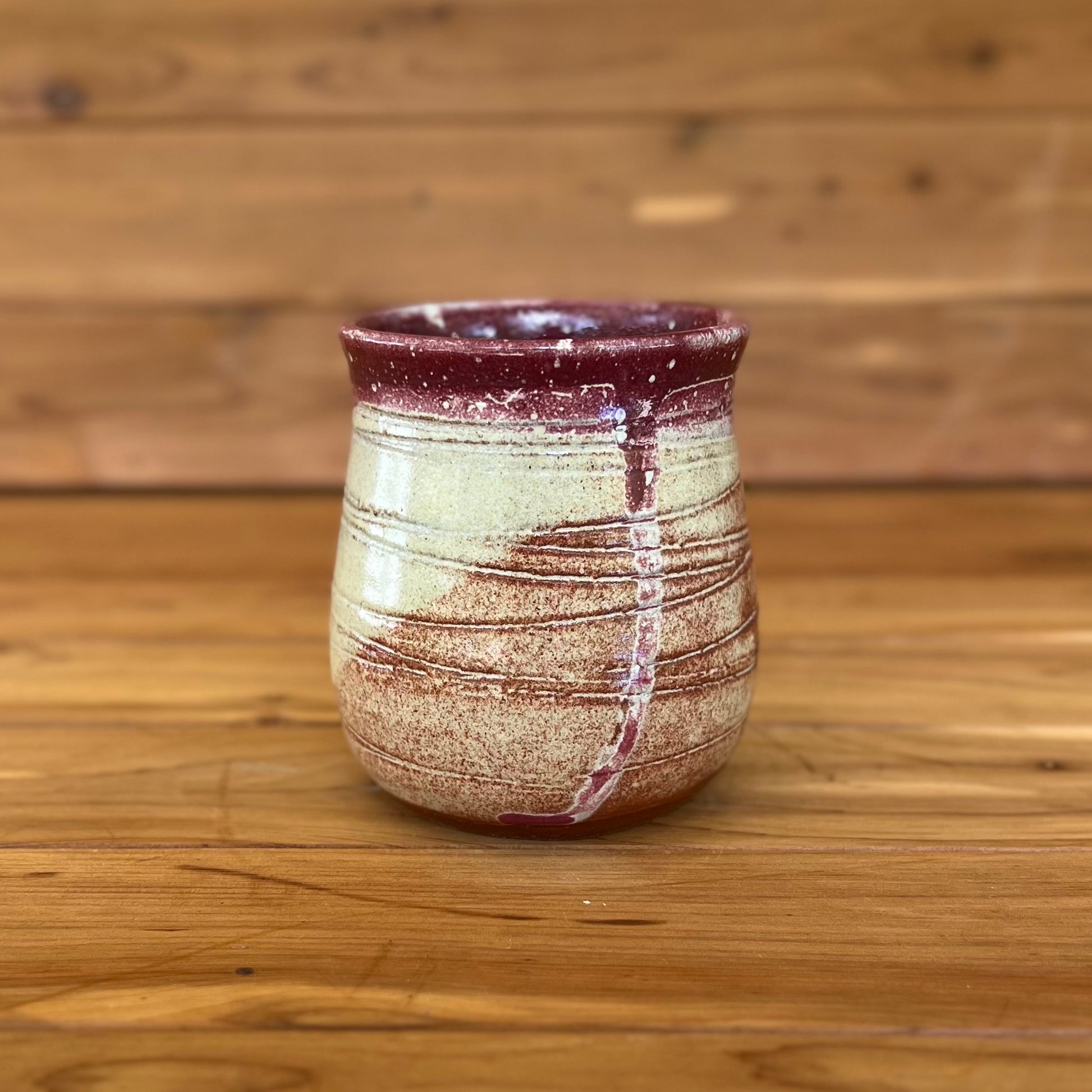 small stemless red ceramic round pottery tumbler