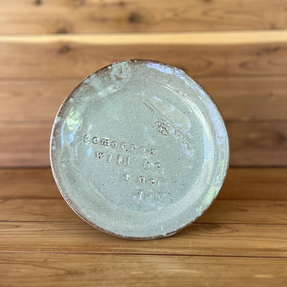 rustic slab built red stone ceramic plate with saying "tomorrow will be a new day" and cream glaze