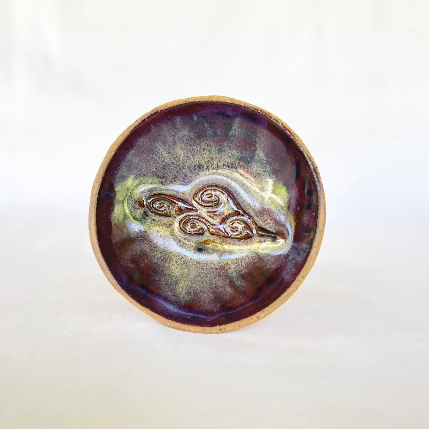 One small ceramic dish with cloud stamp and purple galaxy glaze