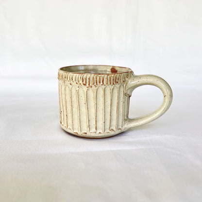 Red and white rustic ceramic coffee mug hand carved